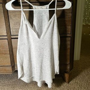 Urban Outfitters black speckled white tank top